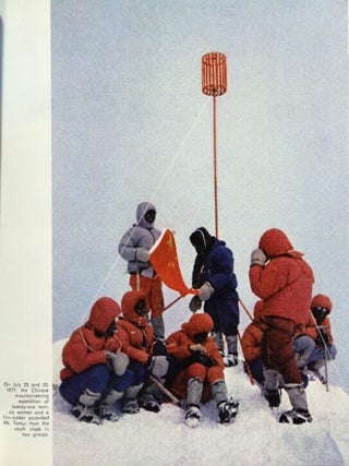 Planting the five-star flag on Mt. Tomur.